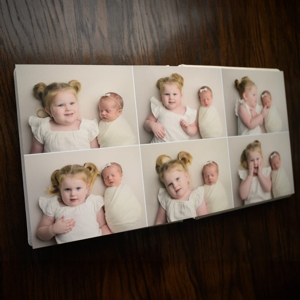 An open album with 6 images of two sisters, one is a toddler and the other is a newborn.