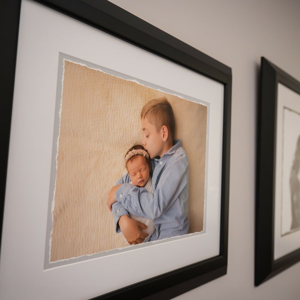 Framed portraits hung on the wall.