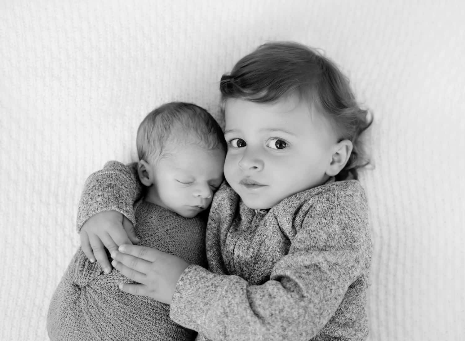 Infant-with-older-brother.jpg